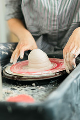 Ceramic mug made on a Potter's wheel in the workshop