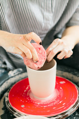 Ceramic mug made on a Potter's wheel in the workshop