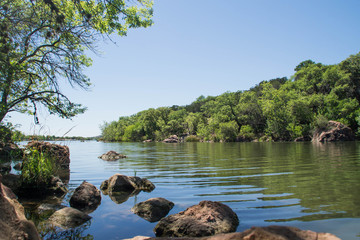 Rocks of Colorado river in Inks Lake State Park, Texas © snatalia