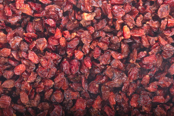 Dried barberries close up background texture