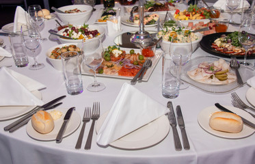 beautifully served dinner table for friends on the anniversary of the highest class