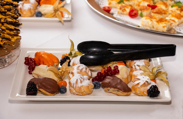 eclairs pastries sweet dessert for a buffet table