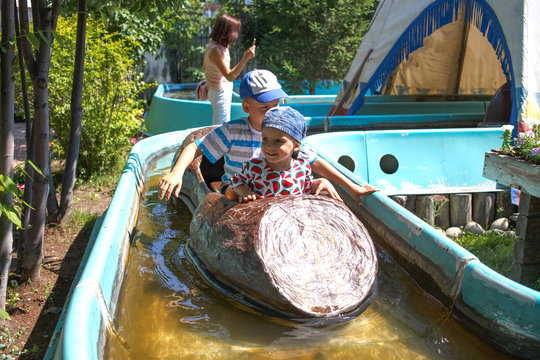 Boys Floating In Lazy River