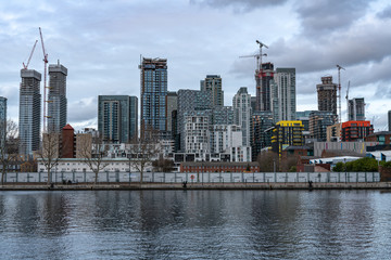 London, UK - March 05, 2019: New homes and developments, modern residential buildings on river...