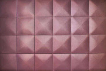 Obraz premium Unusual, beautiful and modern background. Rhombic beige color wall of big squares. Background consists of large beige squares.