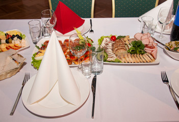 beautifully served table for a festive dinner in a restaurant