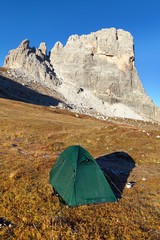 mount Beco de Mezodi with tent, dolomites mountains