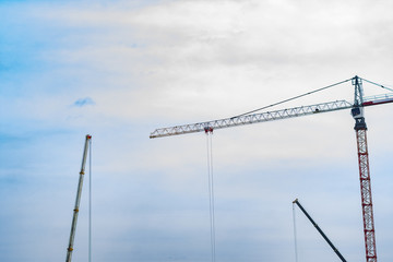 Tower crane against the blue sky