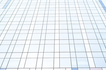 Fototapeta premium Blue toning background with part of a modern business center building