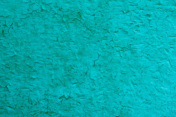 Unicolorous painted cracked wall texture. Background