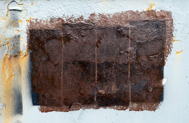 brown paint rectangle on white old dirty iron surface background, copy space