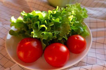 tomatoes and lettuce leaves