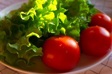 tomatoes and lettuce leaves