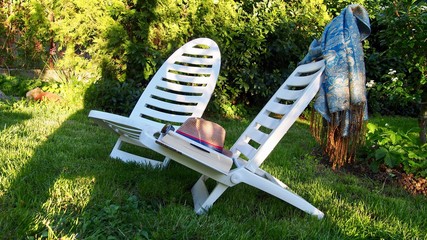 A couple of loungers in an italian garden