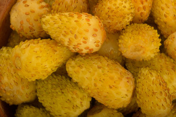 fresh yellow wild strawberry background