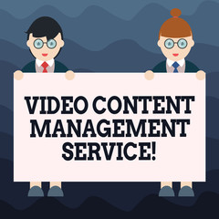 Writing note showing Video Content Management Service. Business photo showcasing Marketing advertising optimization strategy Male and Female in Uniform Holding Placard Banner Text Space