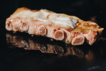 BBQ Roast Marinated Baby Back Pork Ribs Close-up On Hot Flaming Grill Background
