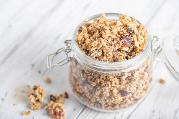 fruit and seed granola in glass jar