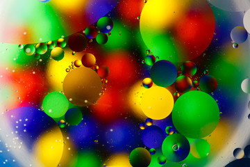 Beautiful abstract space background, mixed drops and water and oil.