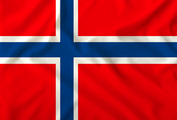 Fototapeta premium The color flag of the state of Norway is depicted on a silk fabric with soft folds,