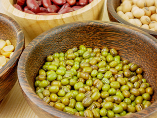 Close up,macro green beans in  wooden bowl