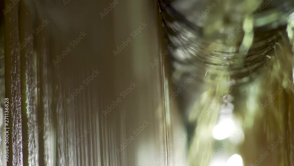 Poster closeup of textiles being automatically weaved during manufacturing processes.