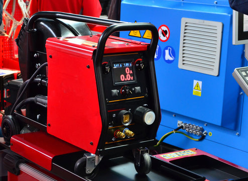 Inverter welding MIG machine. Equipment for welding metals in a protective inert gas environment. - Image