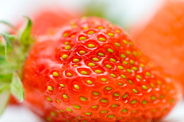 Strawberries on a white background, fresh, tasty and natural strawberries from the garden of his grandfather.