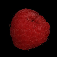 fresh red raspberry isolated on black background