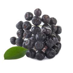 heap of black chokeberry  isolated on white background