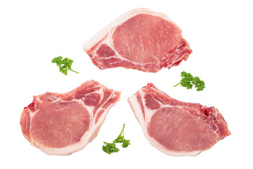 sliced raw pork meat with parsley isolated on white background. Top view. Flat lay