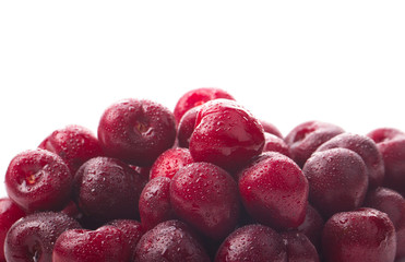 heap of red cherry isolated on white background