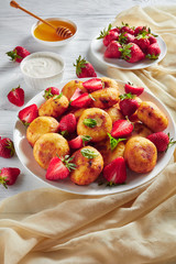 cottage cheese sweet pancakes served with berries