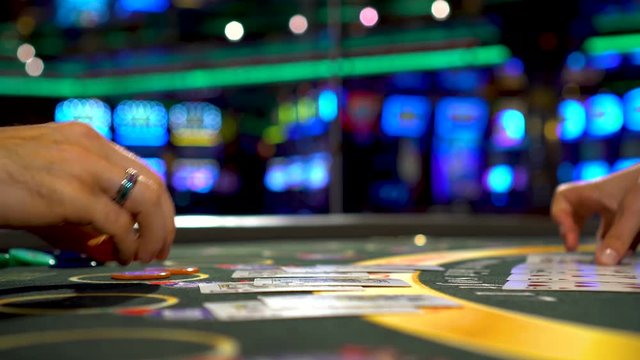 Dealer give back win to the player and deals the cards to play three card poker