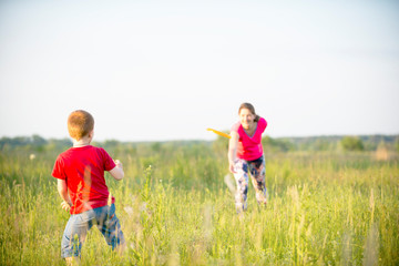 Mom and son play frisbee, Chernigov, Ukraine, May 30, 2019.