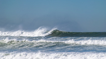 Fototapeta premium Atlantic ocean waves breaking onto beach in Agadir, Morocco