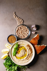 Hummus with olive oil and ground cumin
