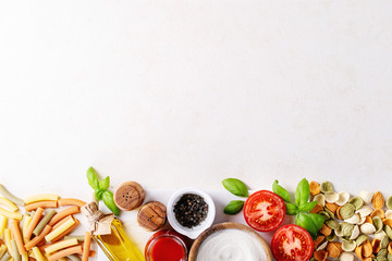 Raw ingredients for cooking Italian penne pasta