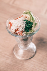 cocktail salad with fresh vegetables and Suluguni cheese