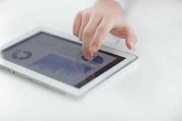 close up.businessman using digital tablet. photo with copy space