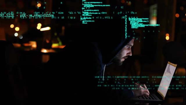 Hacker using a laptop