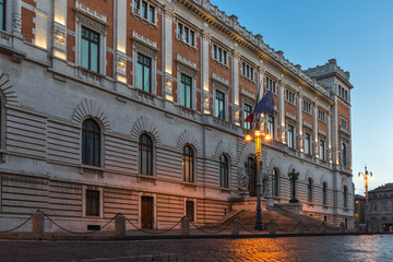 Fototapeta premium Sunset view of building of Banco di Napoli in city of Rome, Italy