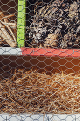  insect hotel fishing net on beach
