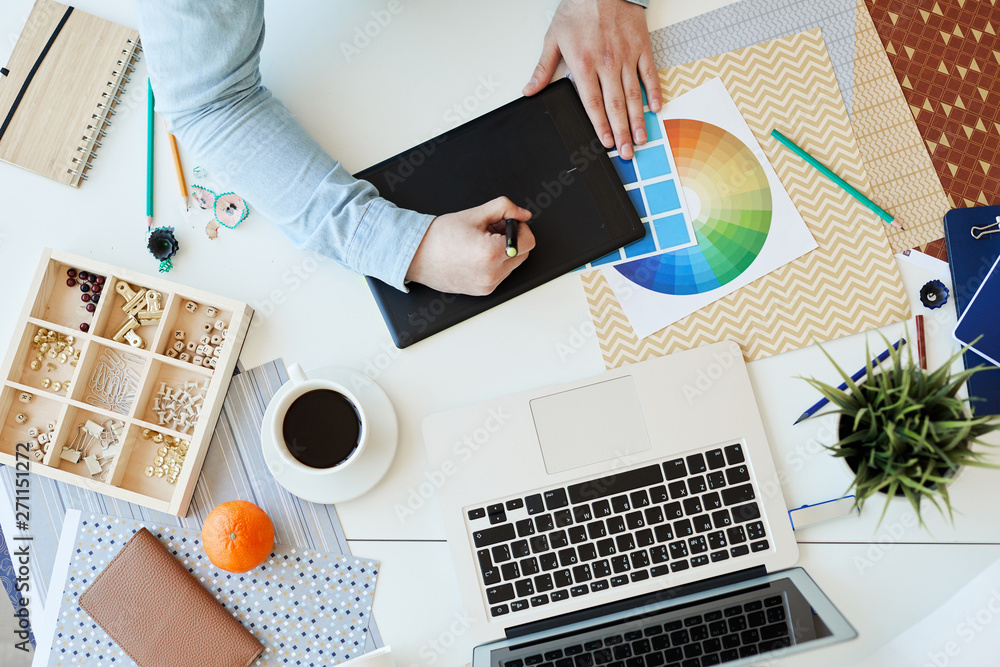 Aufkleber high angle view of unrecognizable creative graphic designer working with drawing tablet while workin