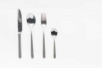 Cutlery fork , knife and plates on the table