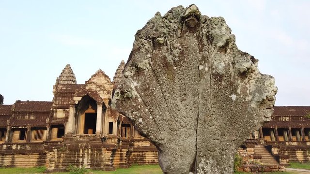 Angkor Wat temple in Cambodia back side. in the foreground, snake Naga.