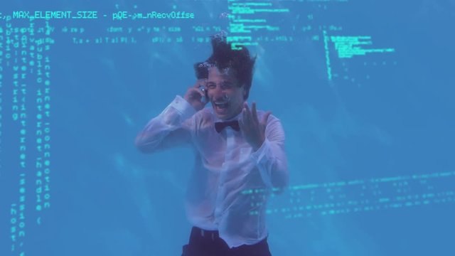 Man using a mobile phone under water