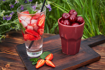 Fresh drink with strawberry / studio photography of beverages isolated on white background with...