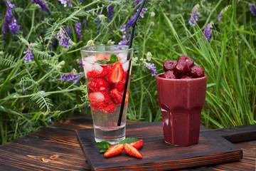 Fresh drink with strawberry / studio photography of beverages isolated on white background with...