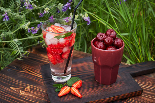 Fresh drink with strawberry / studio photography of beverages isolated on white background with reflection